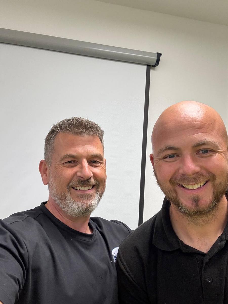 Adam Henderson with oven repair trainer Jonny Barr