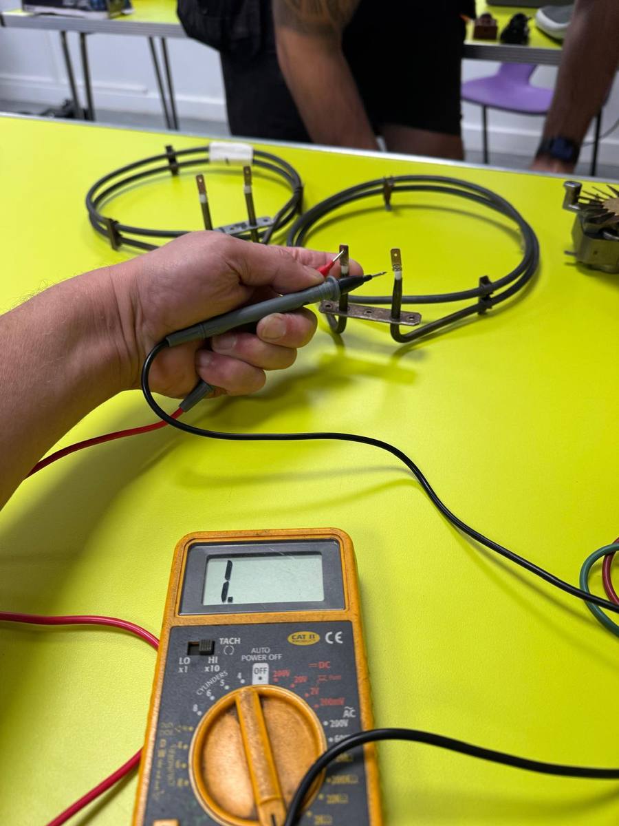 Multimeter reading on a fan oven element during a continuity test